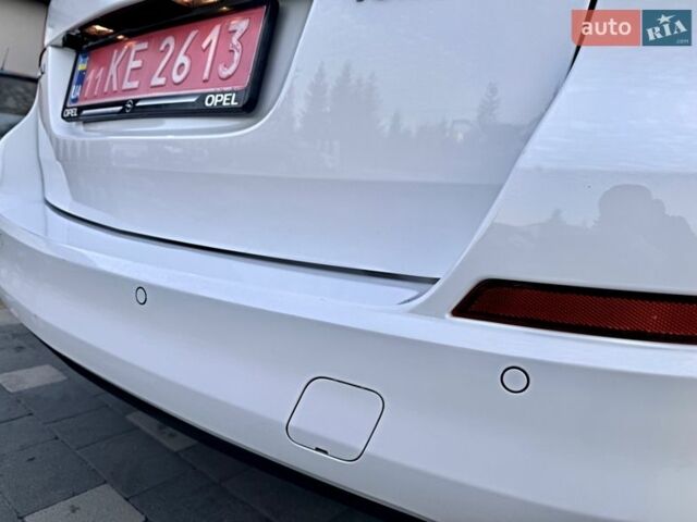 Білий Опель Астра, об'ємом двигуна 1.4 л та пробігом 228 тис. км за 6555 $, фото 19 на Automoto.ua