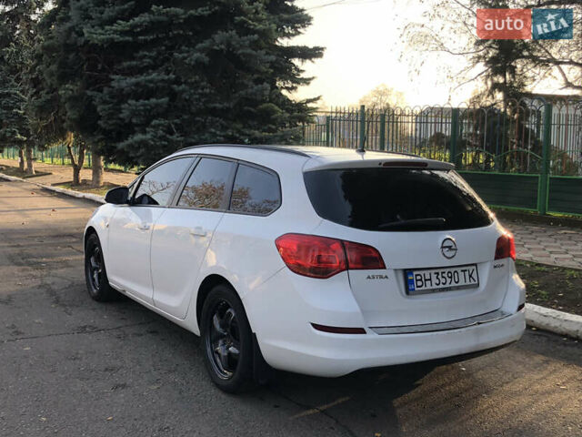 Белый Опель Астра, объемом двигателя 1.25 л и пробегом 321 тыс. км за 7499 $, фото 3 на Automoto.ua