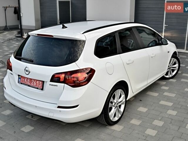 Білий Опель Астра, об'ємом двигуна 1.4 л та пробігом 228 тис. км за 6555 $, фото 17 на Automoto.ua