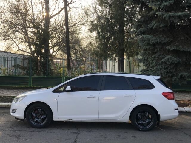 Білий Опель Астра, об'ємом двигуна 1.2 л та пробігом 299 тис. км за 7499 $, фото 2 на Automoto.ua