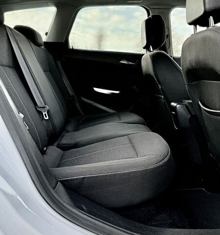 Білий Опель Астра, об'ємом двигуна 1.4 л та пробігом 228 тис. км за 6555 $, фото 32 на Automoto.ua