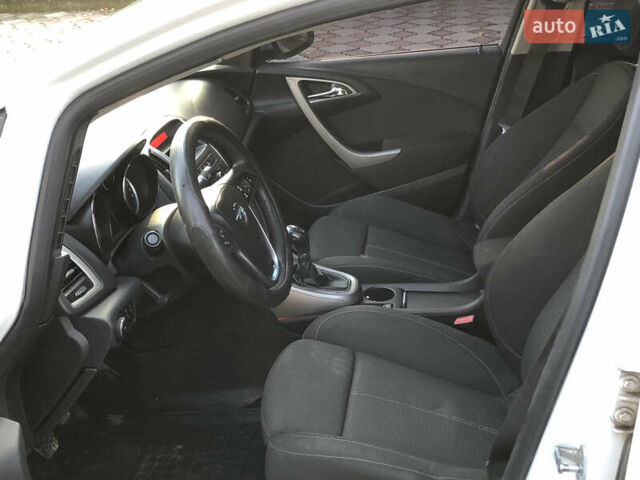 Белый Опель Астра, объемом двигателя 1.25 л и пробегом 321 тыс. км за 7499 $, фото 4 на Automoto.ua