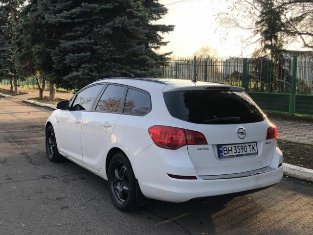 Білий Опель Астра, об'ємом двигуна 1.2 л та пробігом 299 тис. км за 7499 $, фото 3 на Automoto.ua