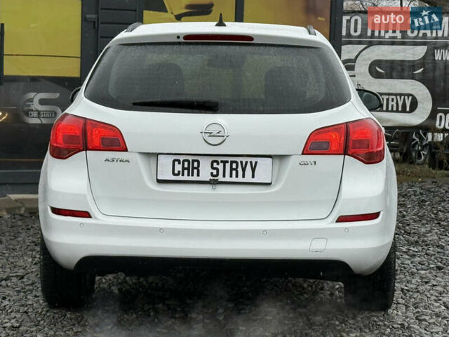 Белый Опель Астра, объемом двигателя 1.7 л и пробегом 300 тыс. км за 6999 $, фото 14 на Automoto.ua