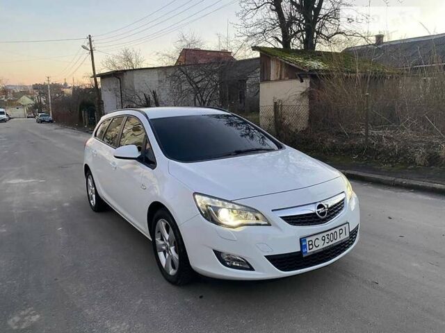 Білий Опель Астра, об'ємом двигуна 1.69 л та пробігом 228 тис. км за 7400 $, фото 2 на Automoto.ua