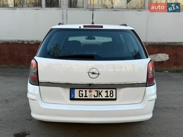 Белый Опель Астра, объемом двигателя 1.7 л и пробегом 246 тыс. км за 4997 $, фото 14 на Automoto.ua
