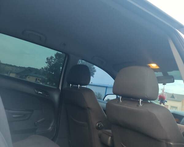 Белый Опель Астра, объемом двигателя 1.69 л и пробегом 260 тыс. км за 5900 $, фото 13 на Automoto.ua