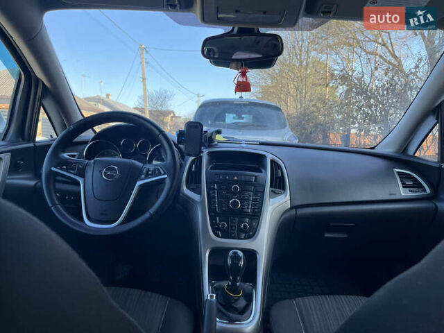 Белый Опель Астра, объемом двигателя 1.25 л и пробегом 255 тыс. км за 5800 $, фото 5 на Automoto.ua