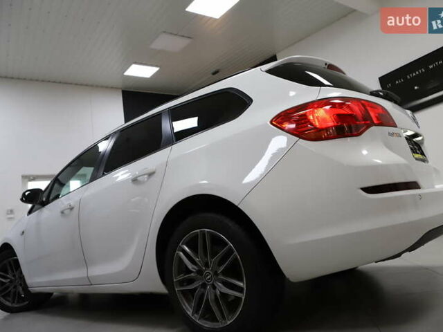 Білий Опель Астра, об'ємом двигуна 1.7 л та пробігом 144 тис. км за 8899 $, фото 76 на Automoto.ua