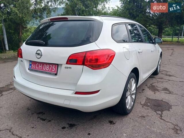 Опель Астра 2012 в Стрые на Automoto.ua Белый Опель Астра, объемом двигателя 1.7 л и пробегом 198 тыс. км за 7350 $, фото 14 на Automoto.ua
