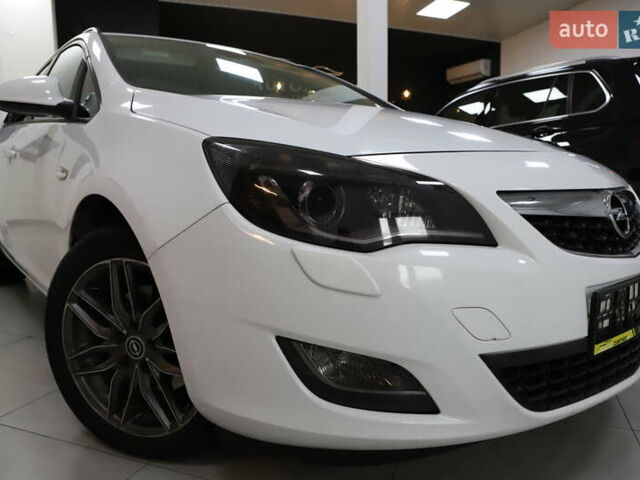 Білий Опель Астра, об'ємом двигуна 1.7 л та пробігом 144 тис. км за 8899 $, фото 33 на Automoto.ua