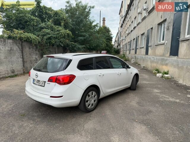 Белый Опель Астра, объемом двигателя 1.7 л и пробегом 244 тыс. км за 7300 $, фото 4 на Automoto.ua