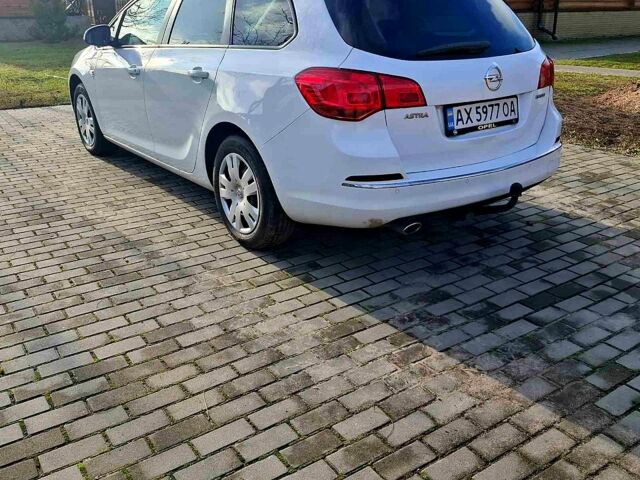 Белый Опель Астра, объемом двигателя 2 л и пробегом 18600 тыс. км за 7300 $, фото 2 на Automoto.ua