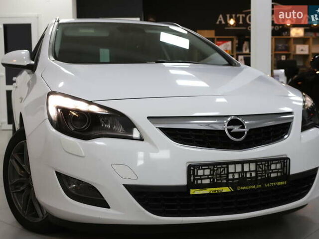 Білий Опель Астра, об'ємом двигуна 1.7 л та пробігом 144 тис. км за 8899 $, фото 35 на Automoto.ua
