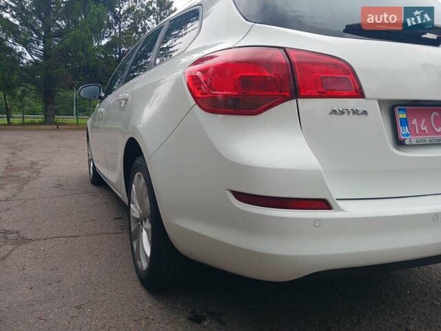 Опель Астра 2012 в Стрые на Automoto.ua Белый Опель Астра, объемом двигателя 1.7 л и пробегом 198 тыс. км за 7350 $, фото 10 на Automoto.ua