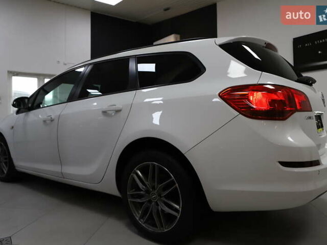 Білий Опель Астра, об'ємом двигуна 1.7 л та пробігом 144 тис. км за 8899 $, фото 8 на Automoto.ua