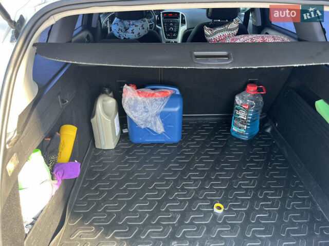 Белый Опель Астра, объемом двигателя 1.25 л и пробегом 255 тыс. км за 5800 $, фото 8 на Automoto.ua