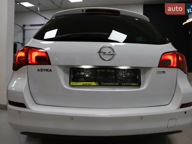 Білий Опель Астра, об'ємом двигуна 1.7 л та пробігом 144 тис. км за 8899 $, фото 7 на Automoto.ua