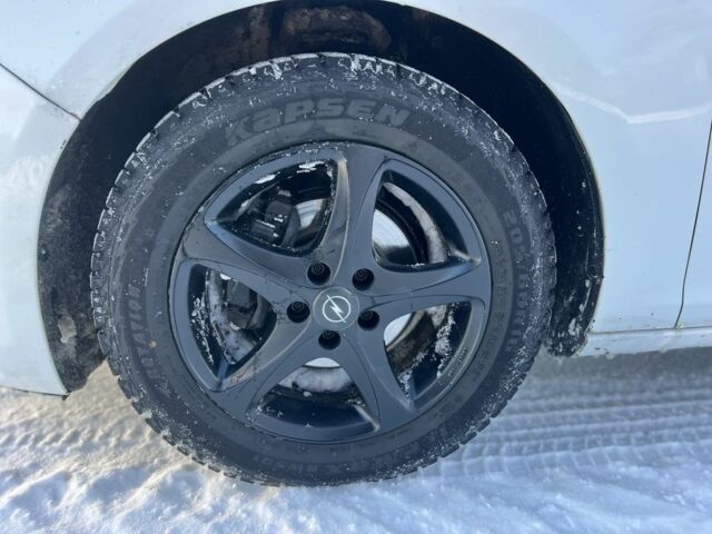 Белый Опель Астра, объемом двигателя 1.2 л и пробегом 287 тыс. км за 5600 $, фото 17 на Automoto.ua