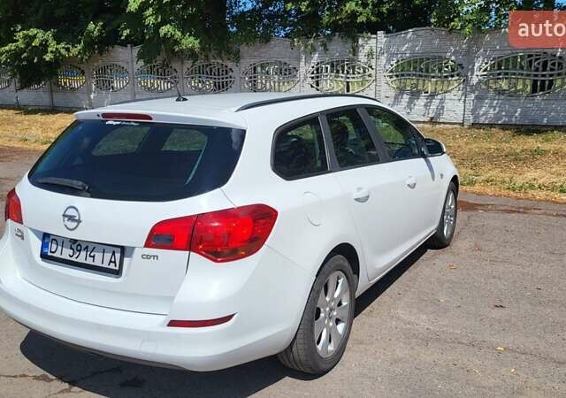 Белый Опель Астра, объемом двигателя 1.7 л и пробегом 200 тыс. км за 7800 $, фото 7 на Automoto.ua
