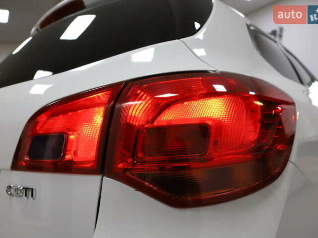 Білий Опель Астра, об'ємом двигуна 1.7 л та пробігом 144 тис. км за 8899 $, фото 25 на Automoto.ua