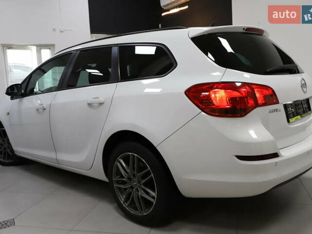 Білий Опель Астра, об'ємом двигуна 1.7 л та пробігом 144 тис. км за 8899 $, фото 39 на Automoto.ua