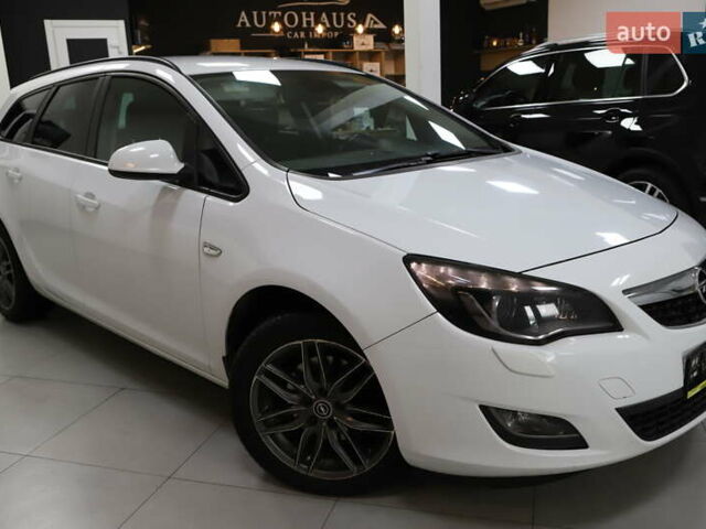 Білий Опель Астра, об'ємом двигуна 1.7 л та пробігом 144 тис. км за 8899 $, фото 31 на Automoto.ua