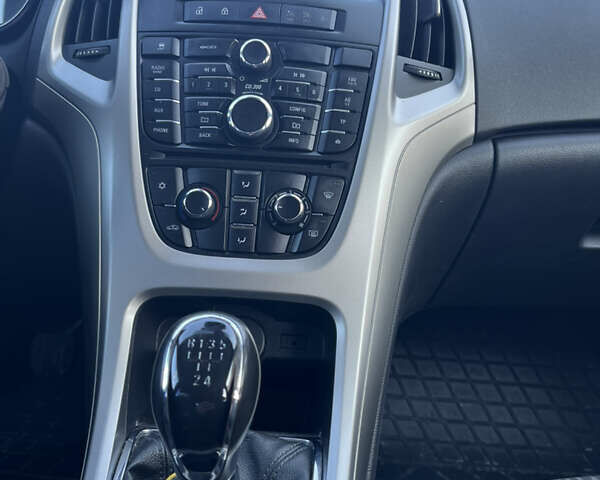 Белый Опель Астра, объемом двигателя 1.25 л и пробегом 255 тыс. км за 5800 $, фото 6 на Automoto.ua