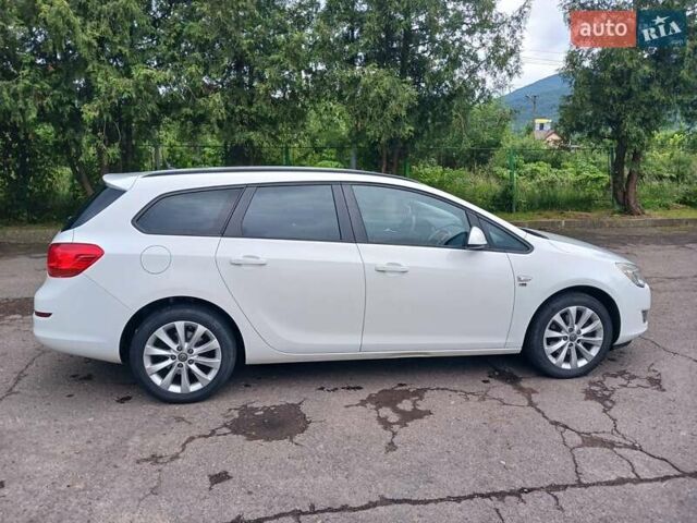 Опель Астра 2012 в Стрые на Automoto.ua Белый Опель Астра, объемом двигателя 1.7 л и пробегом 198 тыс. км за 7350 $, фото 19 на Automoto.ua