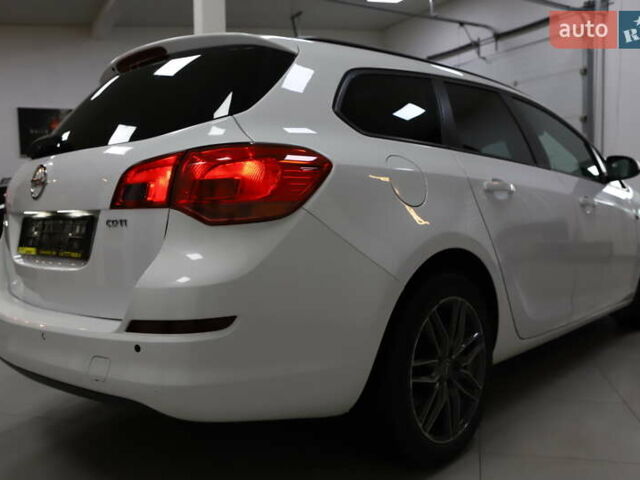 Білий Опель Астра, об'ємом двигуна 1.7 л та пробігом 144 тис. км за 8899 $, фото 5 на Automoto.ua
