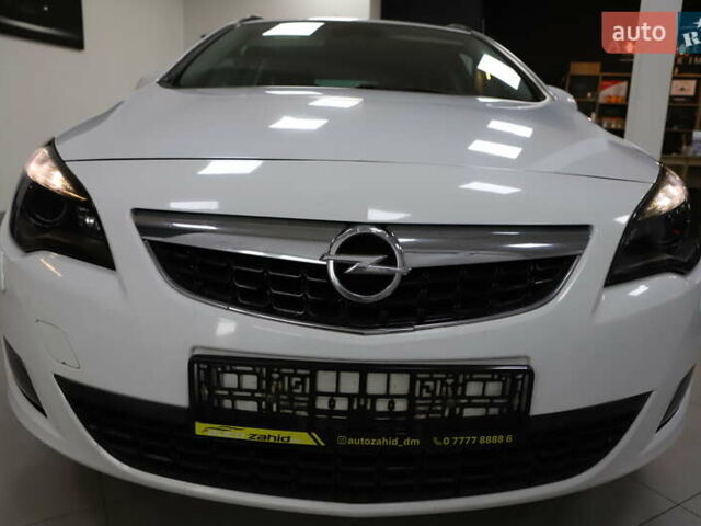 Білий Опель Астра, об'ємом двигуна 1.7 л та пробігом 144 тис. км за 8899 $, фото 2 на Automoto.ua