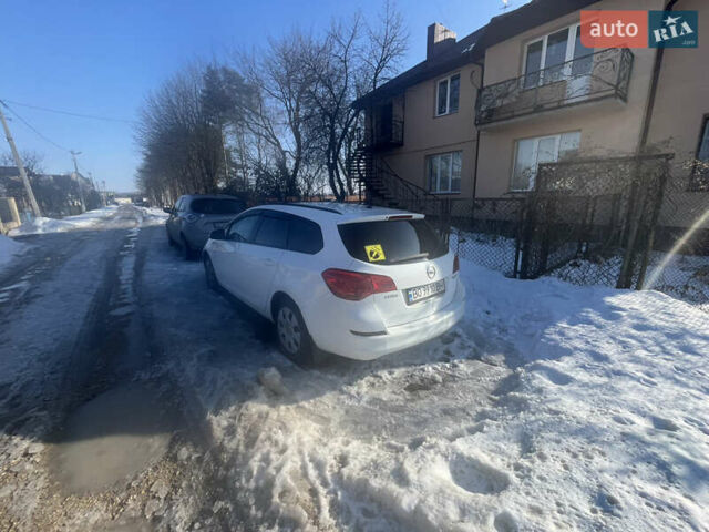 Белый Опель Астра, объемом двигателя 1.25 л и пробегом 255 тыс. км за 5800 $, фото 2 на Automoto.ua