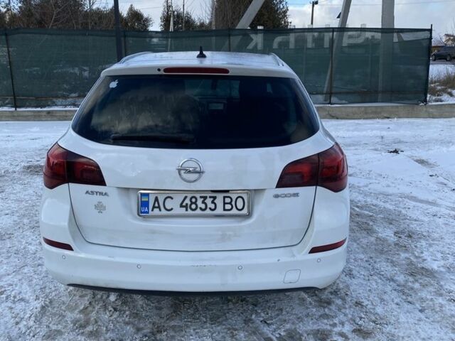 Белый Опель Астра, объемом двигателя 1.2 л и пробегом 3 тыс. км за 5900 $, фото 3 на Automoto.ua