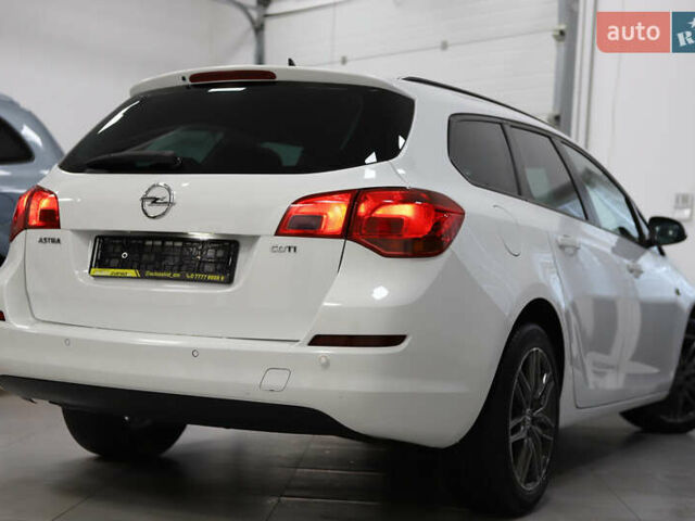 Белый Опель Астра, объемом двигателя 1.7 л и пробегом 140 тыс. км за 7700 $, фото 36 на Automoto.ua