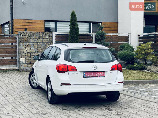 Опель Астра 2013 у Львові на Automoto.ua Білий Опель Астра, об'ємом двигуна 1.7 л та пробігом 192 тис. км за 7300 $, фото 10 на Automoto.ua