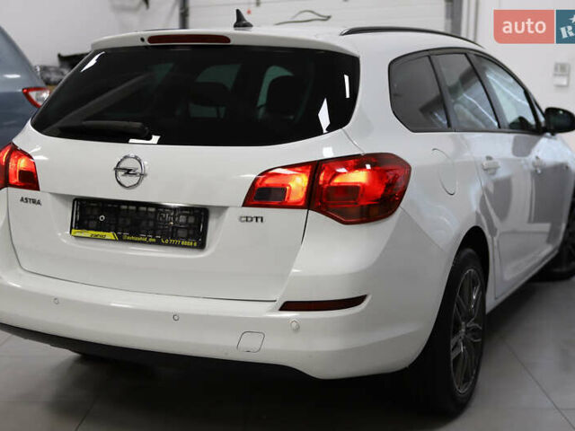 Белый Опель Астра, объемом двигателя 1.7 л и пробегом 140 тыс. км за 7700 $, фото 38 на Automoto.ua