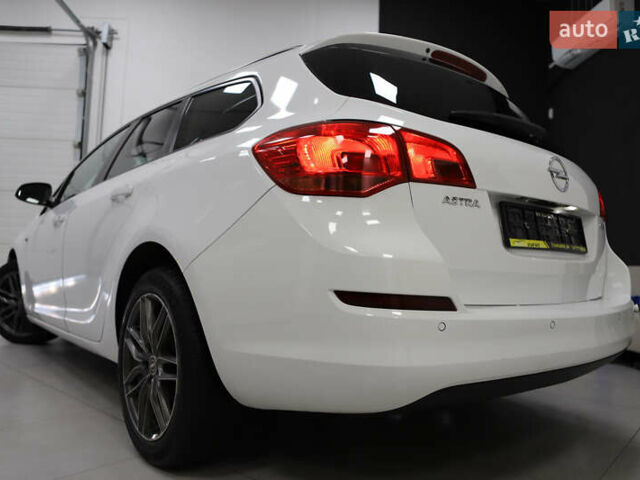 Белый Опель Астра, объемом двигателя 1.7 л и пробегом 140 тыс. км за 7700 $, фото 35 на Automoto.ua