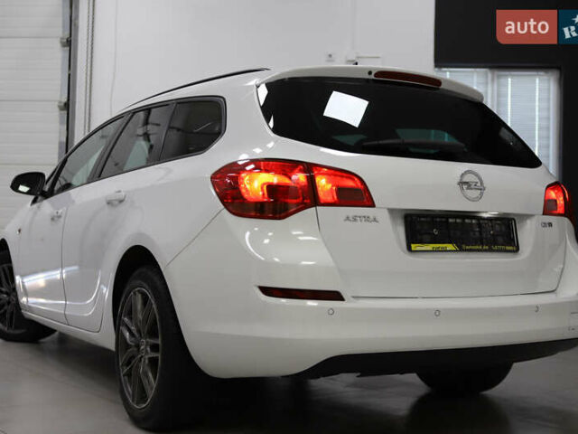 Белый Опель Астра, объемом двигателя 1.7 л и пробегом 140 тыс. км за 7700 $, фото 29 на Automoto.ua