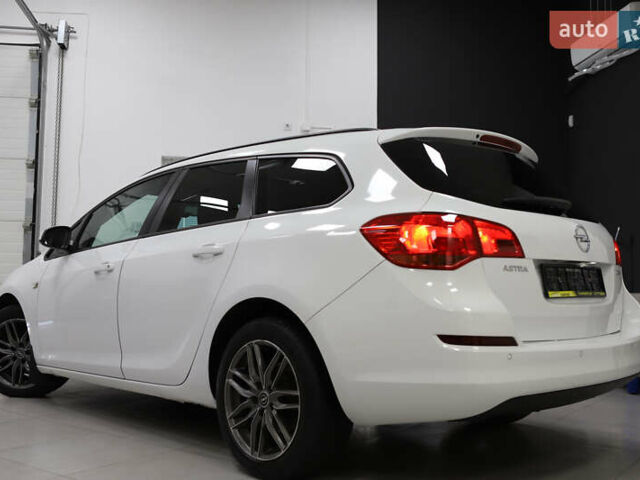 Белый Опель Астра, объемом двигателя 1.7 л и пробегом 140 тыс. км за 7700 $, фото 31 на Automoto.ua