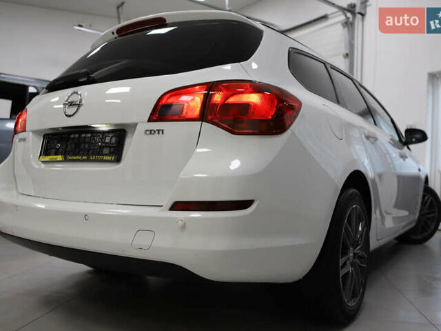 Белый Опель Астра, объемом двигателя 1.7 л и пробегом 140 тыс. км за 7700 $, фото 39 на Automoto.ua