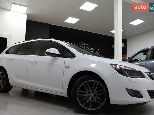 Белый Опель Астра, объемом двигателя 1.7 л и пробегом 140 тыс. км за 7700 $, фото 24 на Automoto.ua