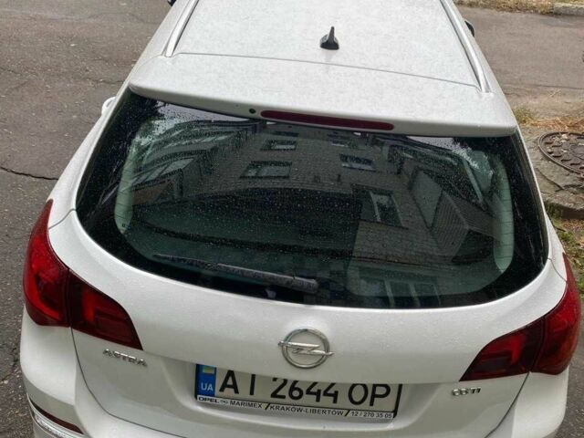 Опель Астра 2013 в Фастове на Automoto.ua Белый Опель Астра, объемом двигателя 1.7 л и пробегом 296 тыс. км за 8000 $, фото 6 на Automoto.ua