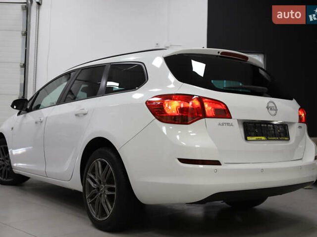 Белый Опель Астра, объемом двигателя 1.7 л и пробегом 140 тыс. км за 7700 $, фото 30 на Automoto.ua