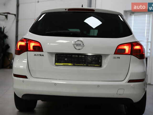 Белый Опель Астра, объемом двигателя 1.7 л и пробегом 140 тыс. км за 7700 $, фото 34 на Automoto.ua