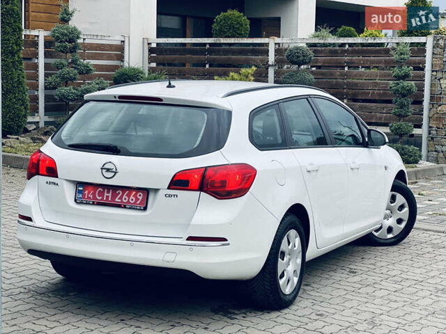 Опель Астра 2013 у Львові на Automoto.ua Білий Опель Астра, об'ємом двигуна 1.7 л та пробігом 192 тис. км за 7300 $, фото 14 на Automoto.ua