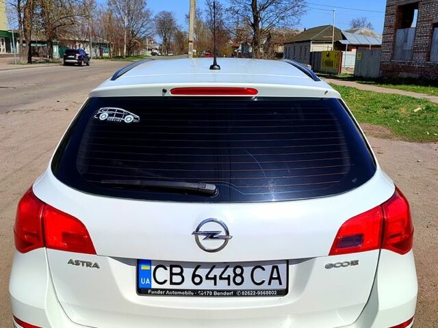Белый Опель Астра, объемом двигателя 1.2 л и пробегом 24000 тыс. км за 6000 $, фото 12 на Automoto.ua
