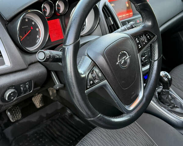 Опель Астра 2014 в Хмельницком на Automoto.ua Белый Опель Астра, объемом двигателя 1.6 л и пробегом 228 тыс. км за 8000 $, фото 6 на Automoto.ua