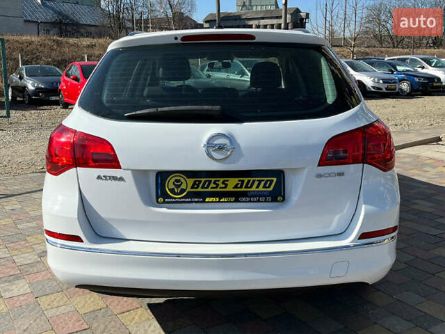 Белый Опель Астра, объемом двигателя 1.4 л и пробегом 176 тыс. км за 7500 $, фото 5 на Automoto.ua