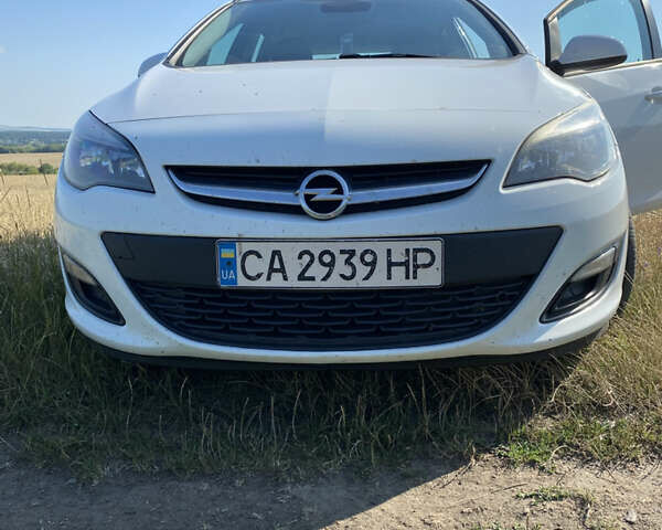 Белый Опель Астра, объемом двигателя 1.3 л и пробегом 250 тыс. км за 7300 $, фото 1 на Automoto.ua