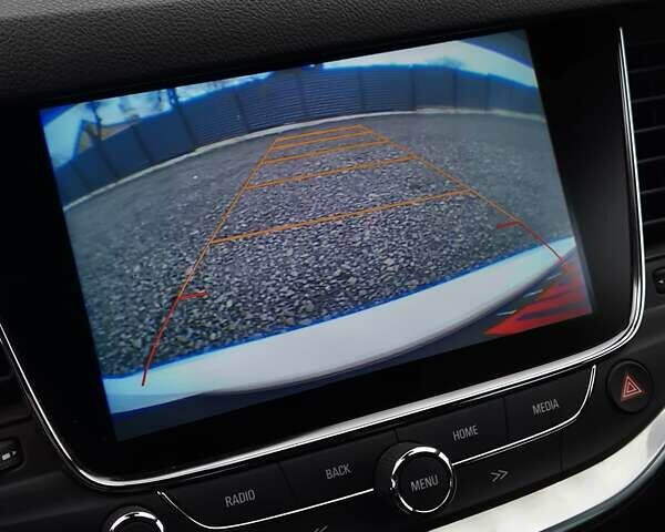 Білий Опель Астра, об'ємом двигуна 1.6 л та пробігом 182 тис. км за 12799 $, фото 44 на Automoto.ua